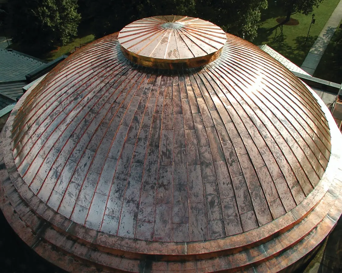 Craftsman Roofing crew installing a new roof in Northville